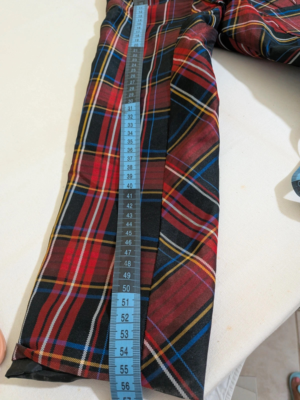 Made in Italy multi tartan skirt suit with black velvet details and structured bolero jacket.