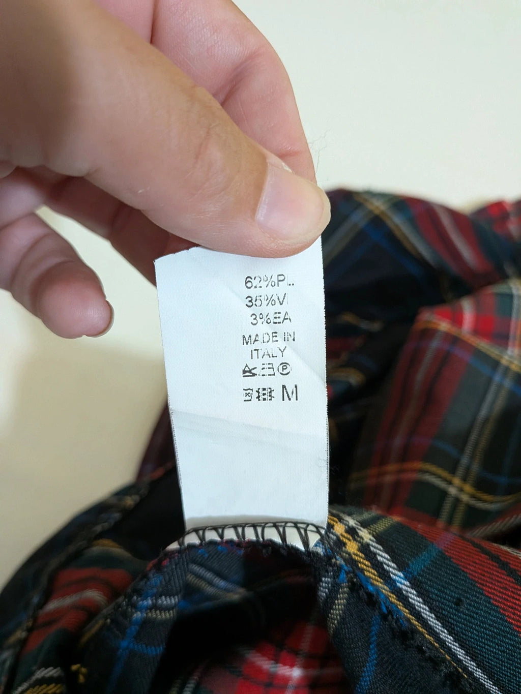 Made in Italy multi tartan skirt suit with black velvet details and structured bolero jacket.