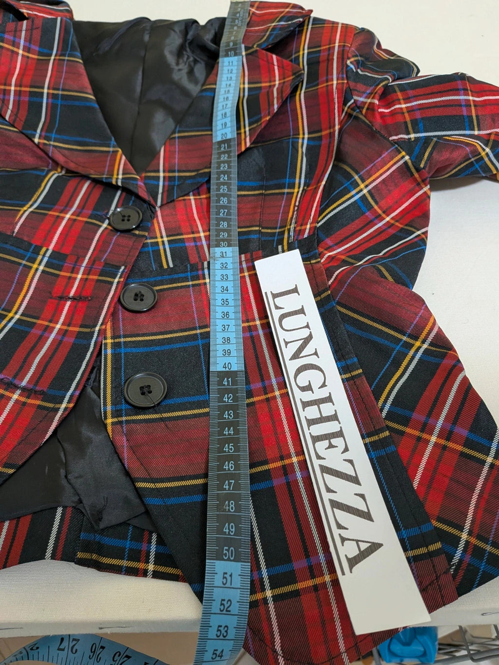 Made in Italy multi tartan skirt suit with black velvet details and structured bolero jacket.