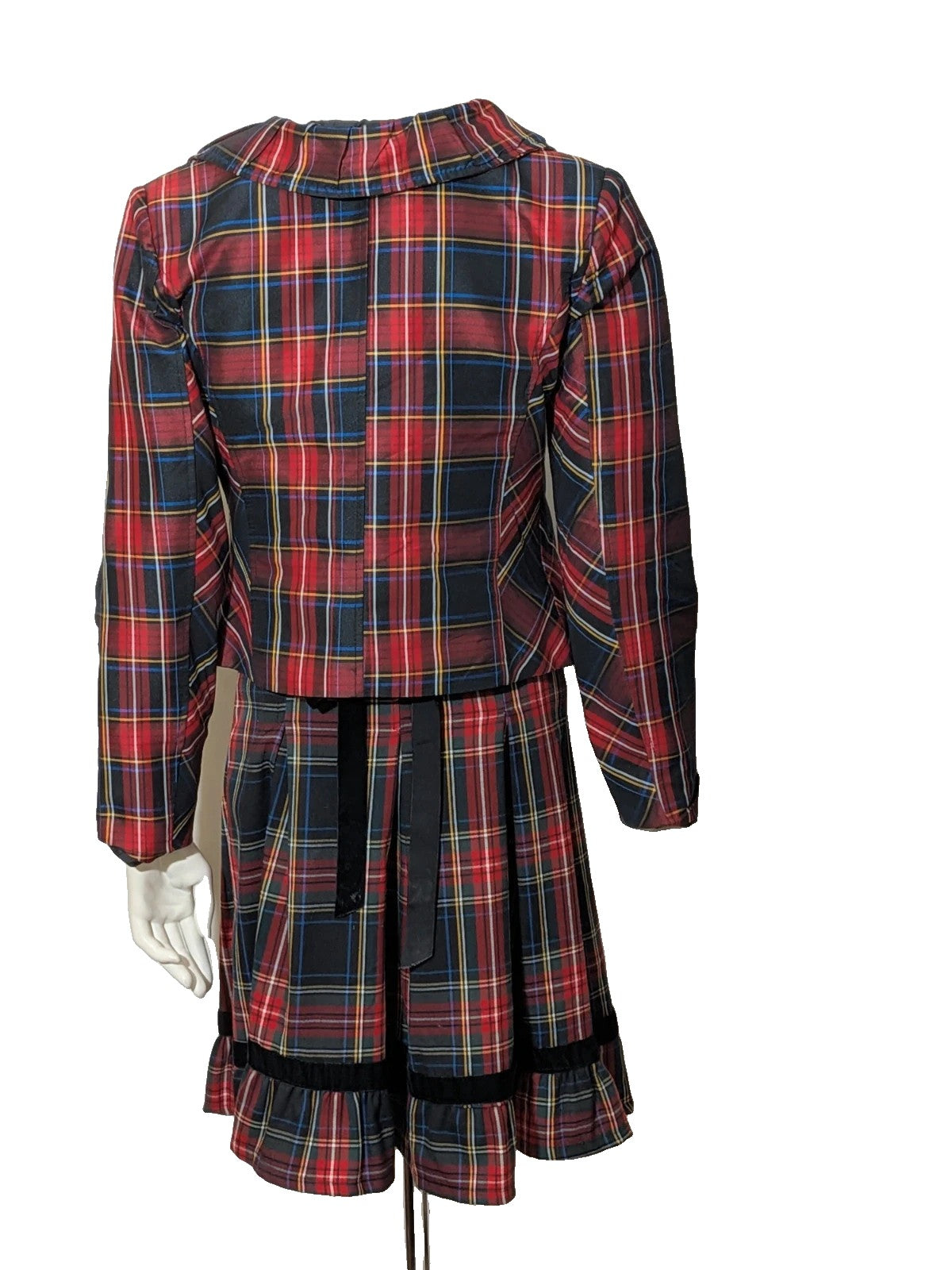 Made in Italy multi tartan skirt suit with black velvet details and structured bolero jacket.