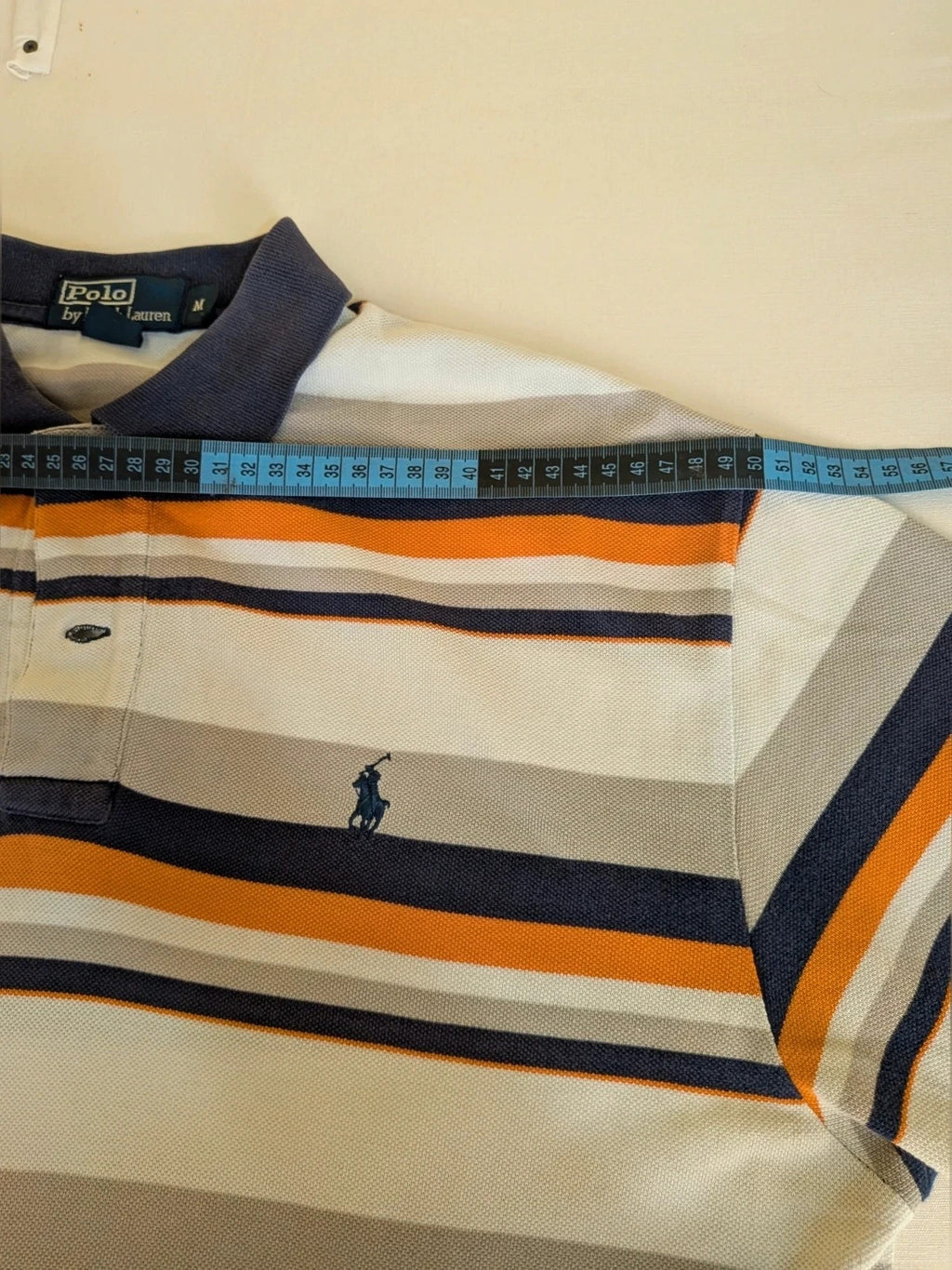 Polo Ralph Lauren multi-coloured polo shirt with horizontal stripes and embroidered logo.
