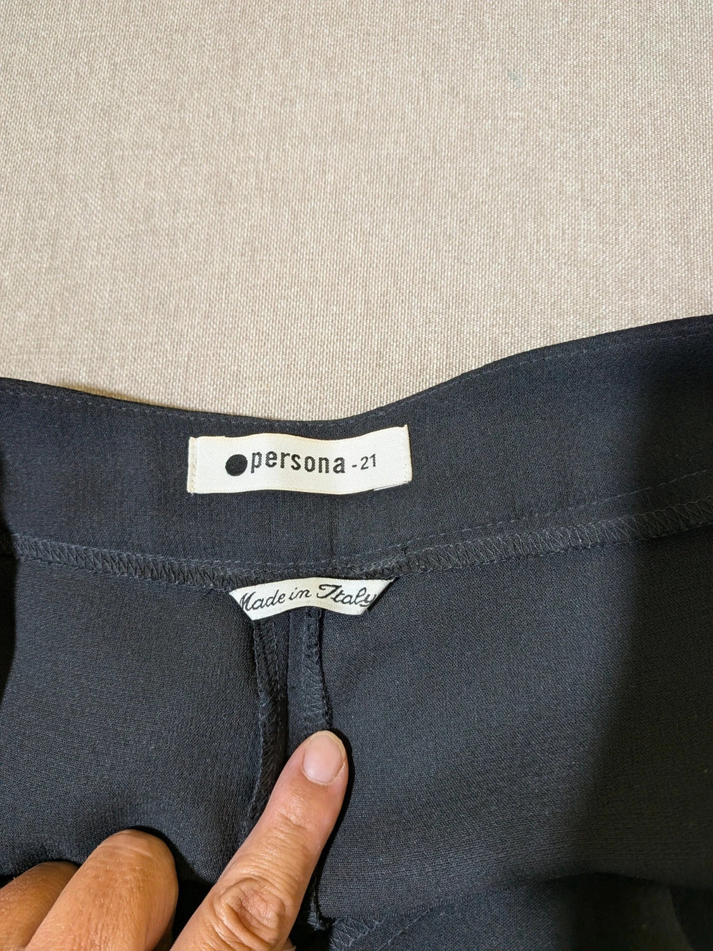 persona 21 black suit jacket and flared pants, 3-button closure, decorative pockets, polyester blend