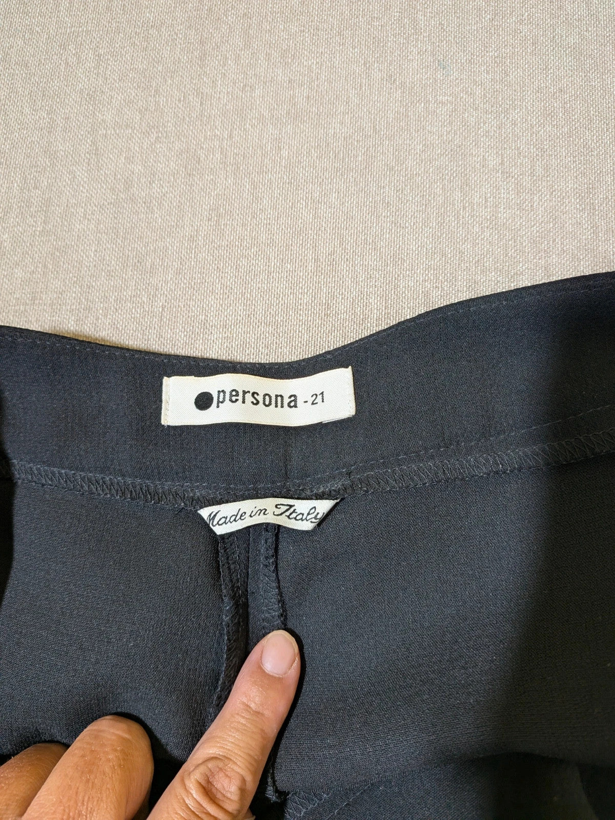 persona 21 black suit jacket and flared pants, 3-button closure, decorative pockets, polyester blend
