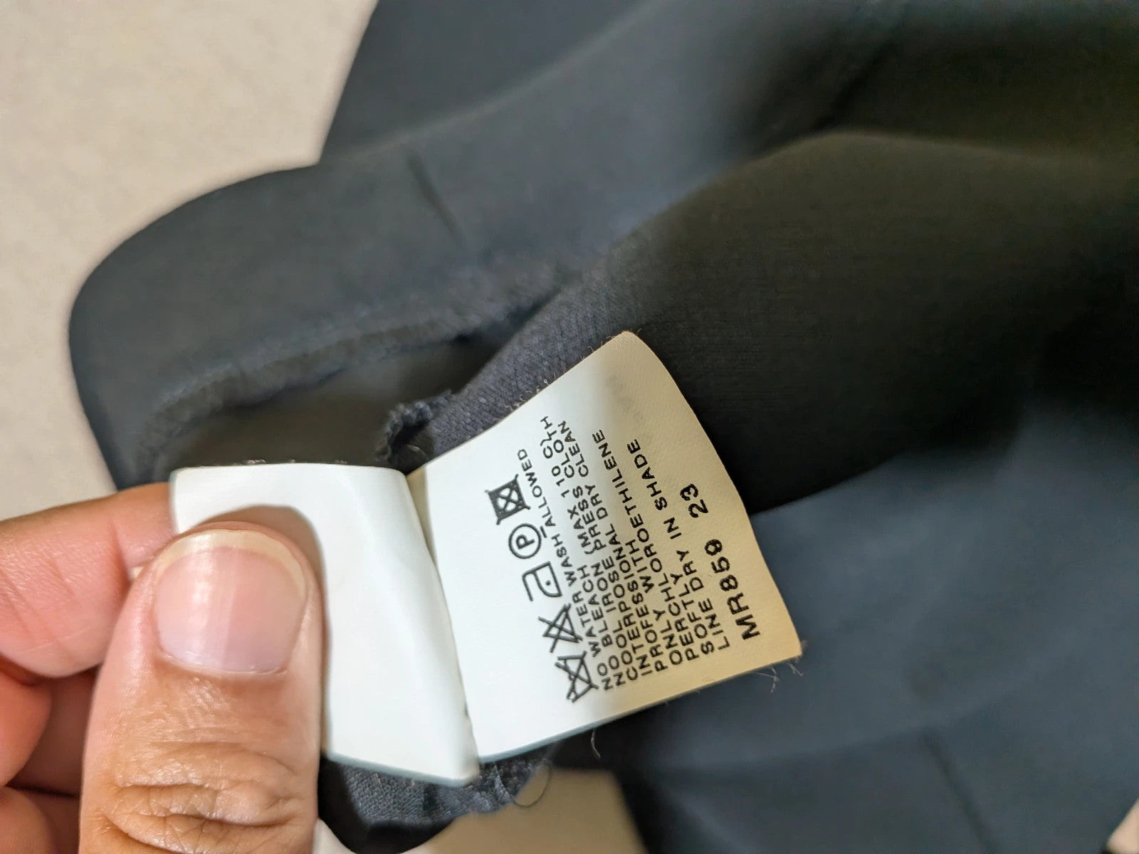 persona 21 black suit jacket and flared pants, 3-button closure, decorative pockets, polyester blend