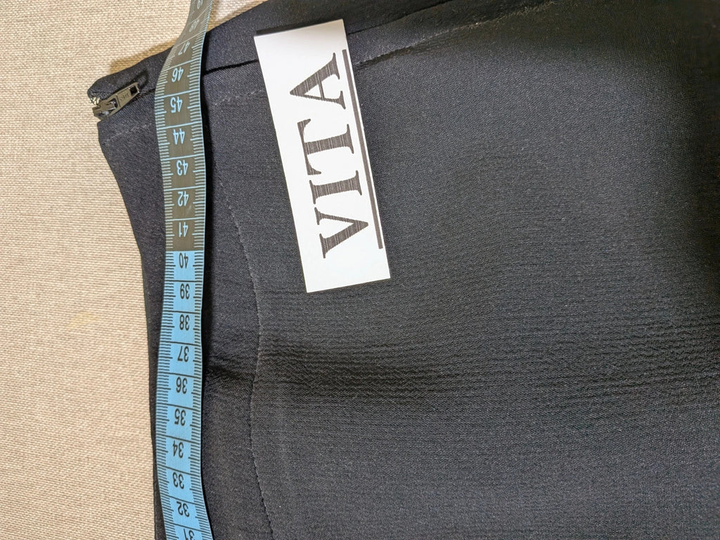 persona 21 black suit jacket and flared pants, 3-button closure, decorative pockets, polyester blend