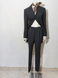 Pheder Studio grey vintage suit with long jacket and tailored pants, excellent condition.