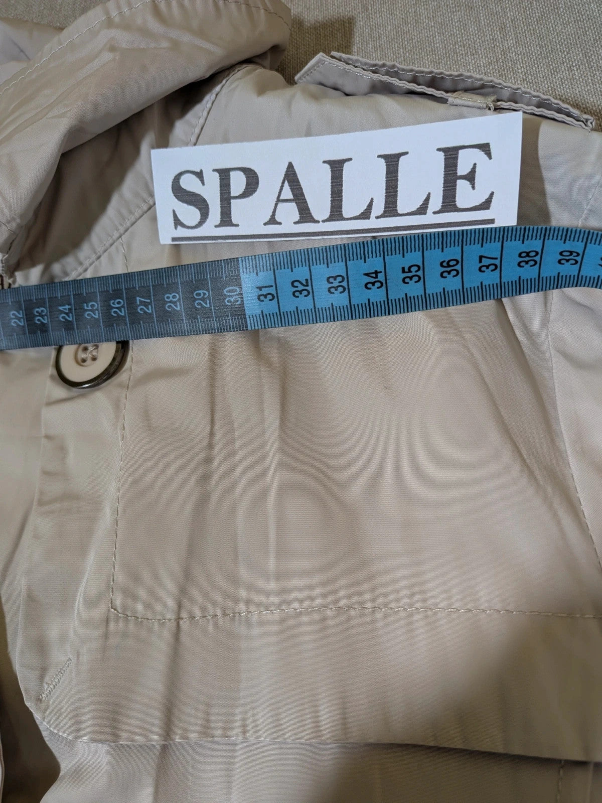 Maps Girl beige trench coat lightweight double-breasted buttons, structured shoulders, adjustable waist belt.
