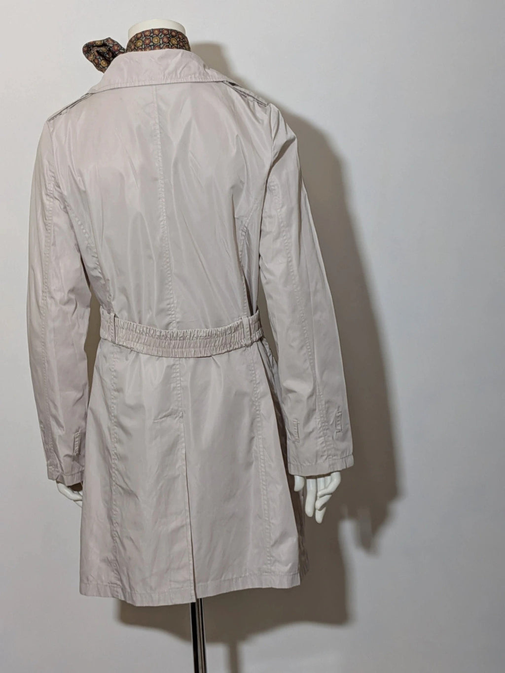Maps Girl beige trench coat lightweight double-breasted buttons, structured shoulders, adjustable waist belt.