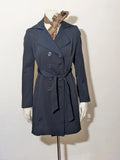 Pepe navy trench coat with double-breasted buttons, belted waist, and structured shoulders.