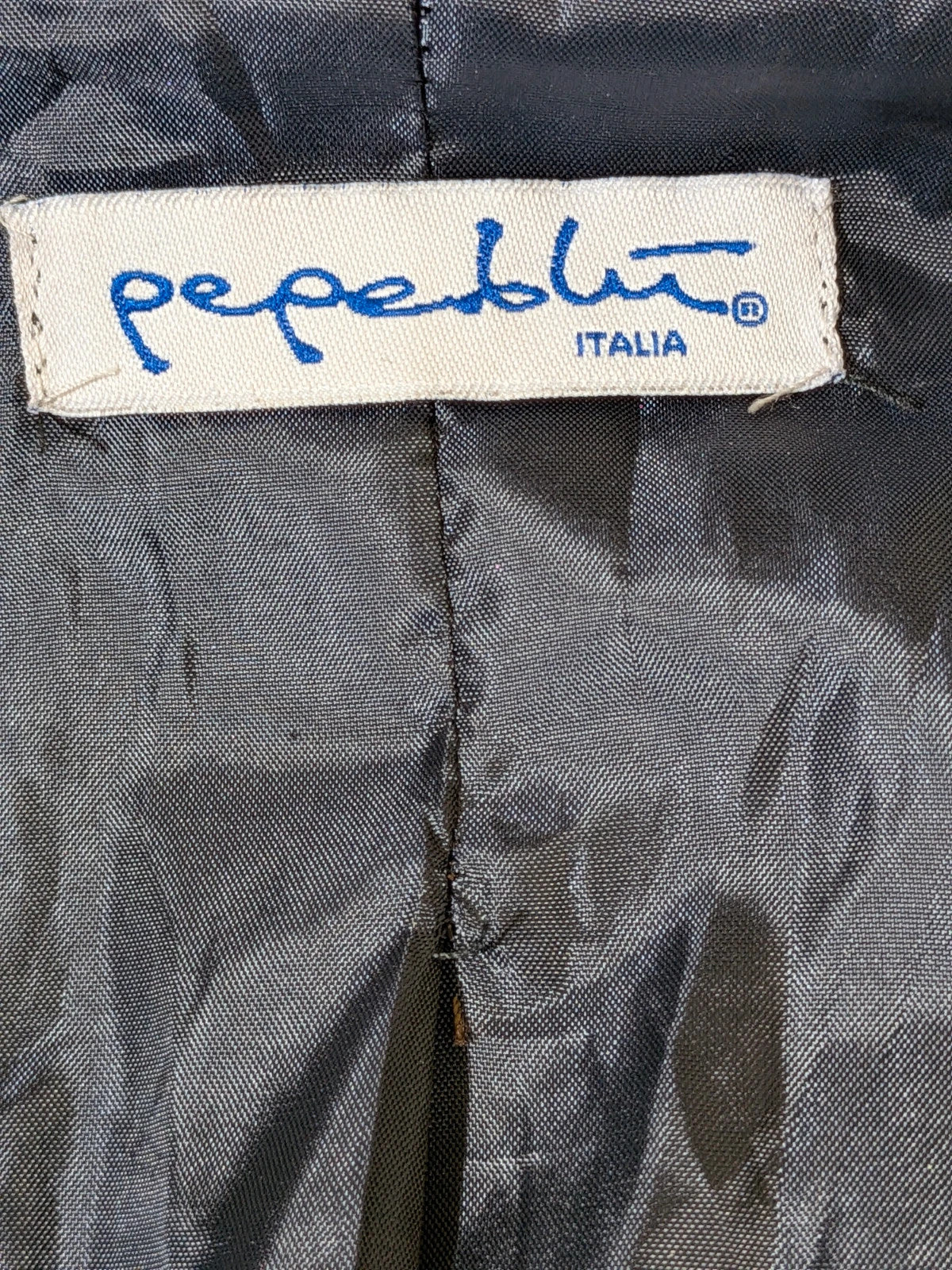 Pepe navy trench coat with double-breasted buttons, belted waist, and structured shoulders.