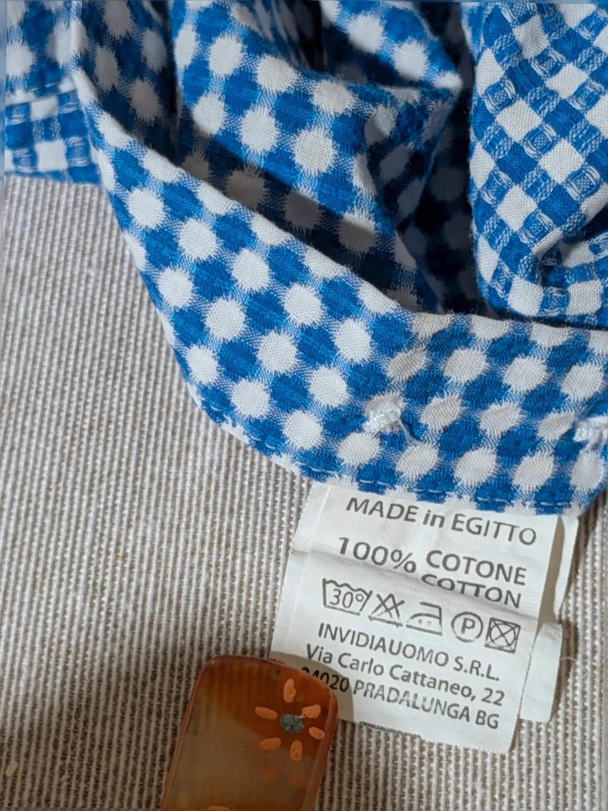 INVIDIA blue and white micro-check shirt with contrasting red collar tape and dark buttons.