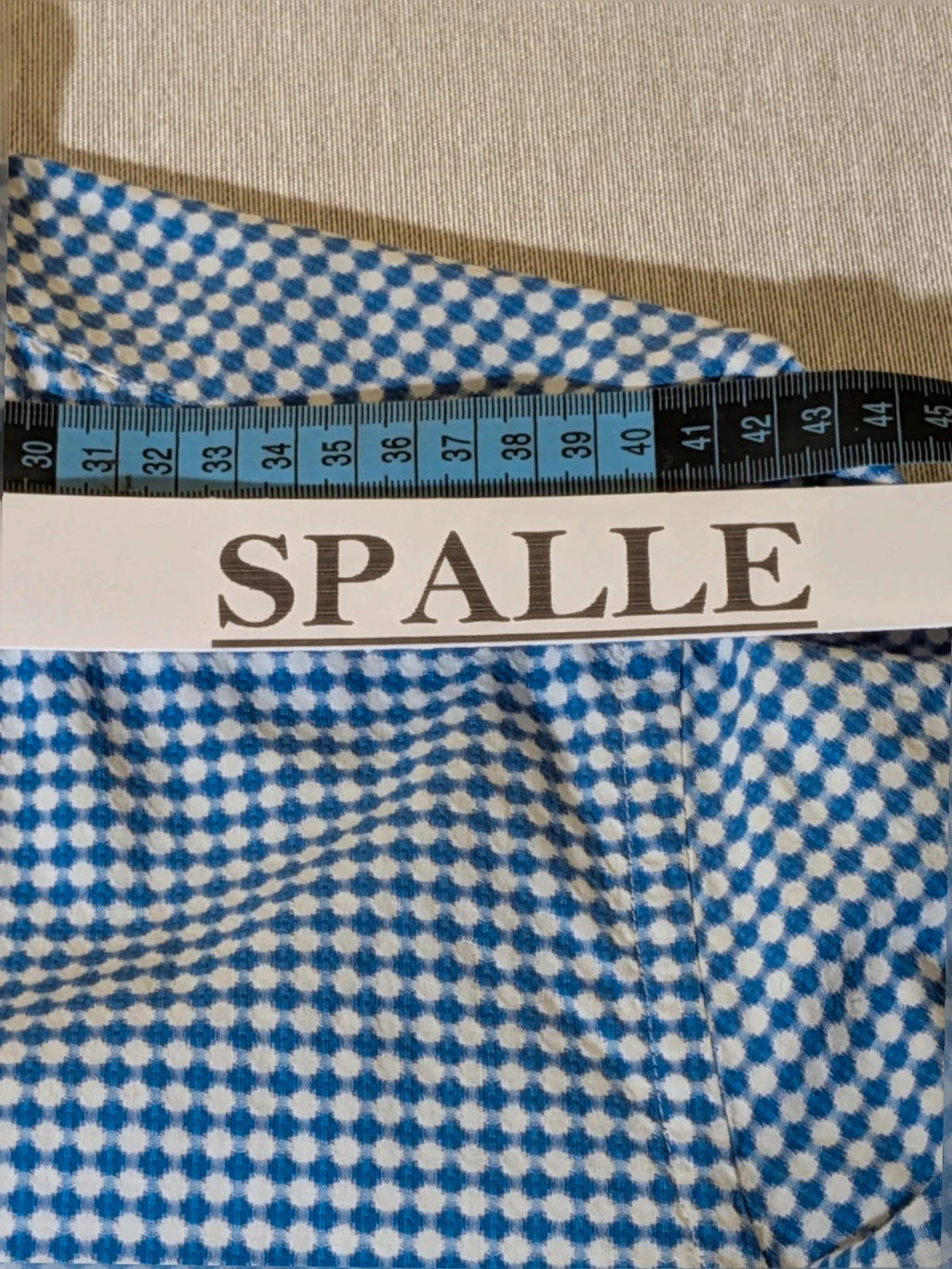 INVIDIA blue and white micro-check shirt with contrasting red collar tape and dark buttons.