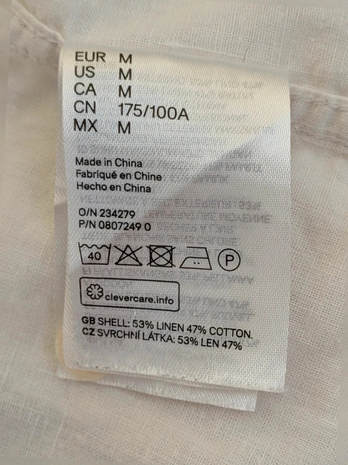 H&M cream men's shirt lightweight linen-cotton blend with dual chest pockets and classic collar.