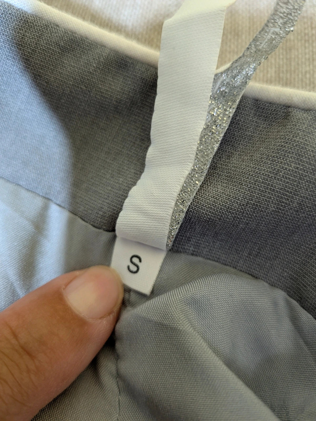 Imperial grey suit with white piping and jewel buttons, elegant fitted blazer and pants.