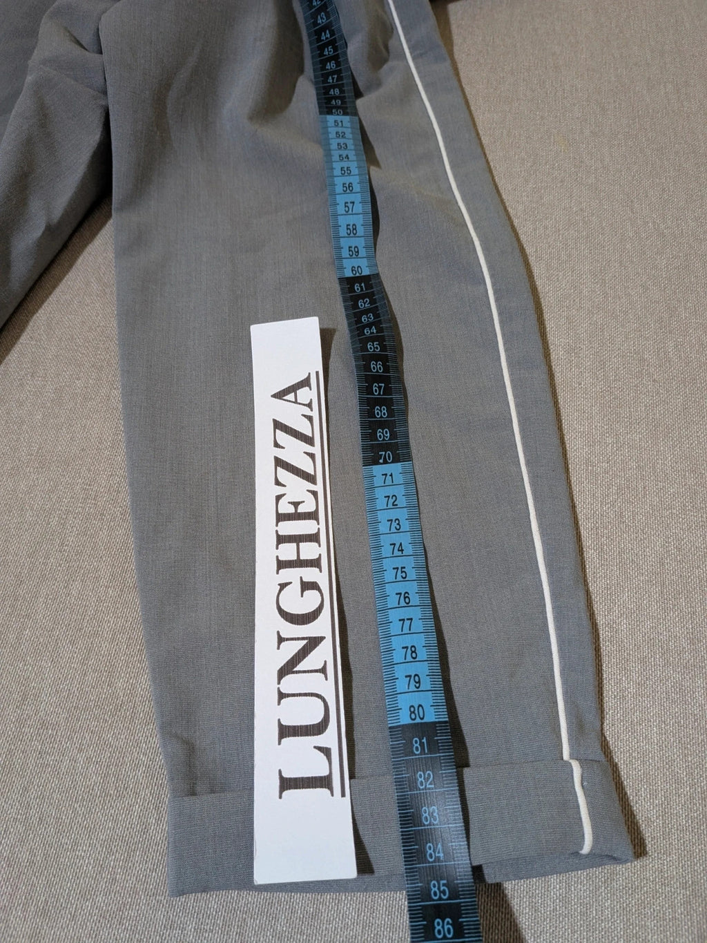 Imperial grey suit with white piping and jewel buttons, elegant fitted blazer and pants.