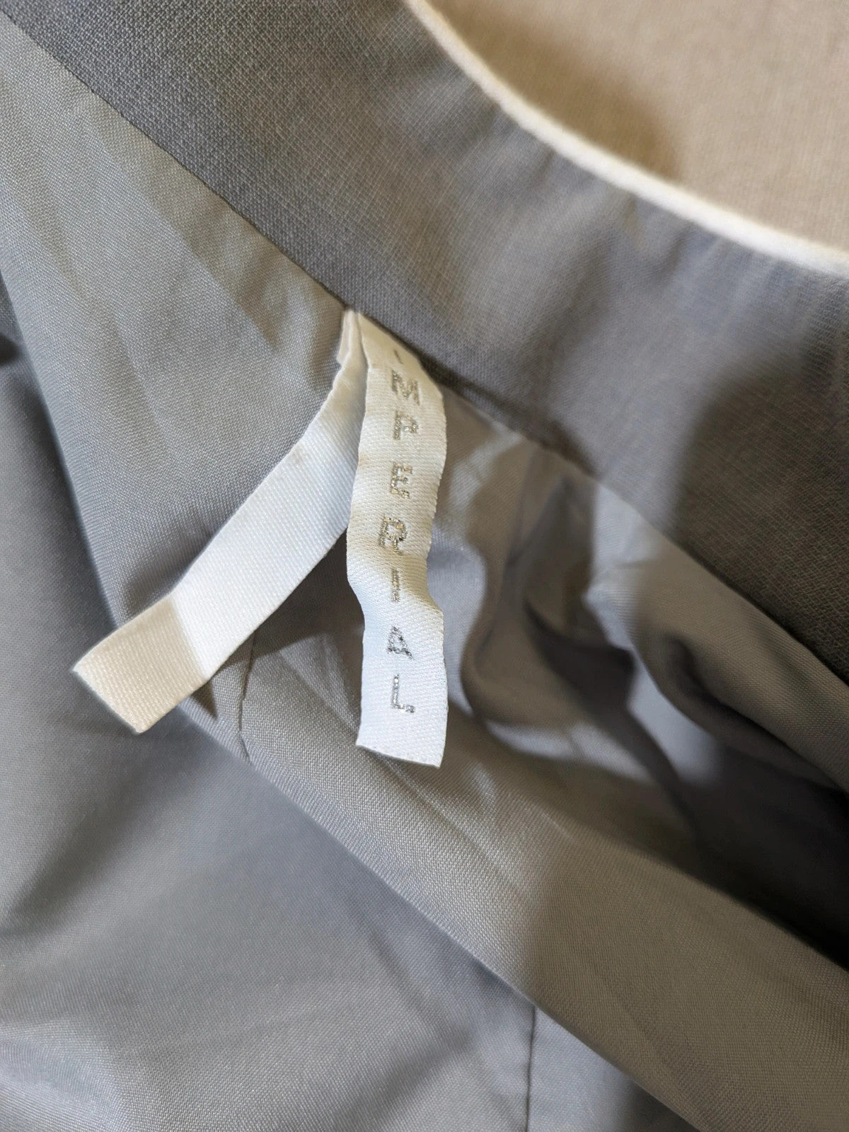 Imperial grey suit with white piping and jewel buttons, elegant fitted blazer and pants.