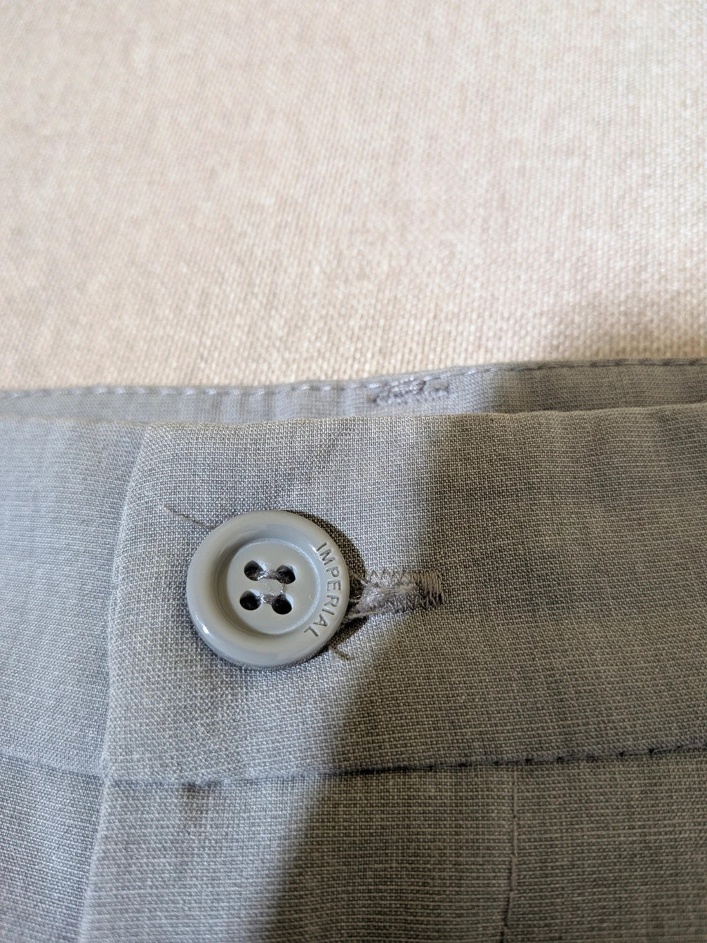 Imperial grey suit with white piping and jewel buttons, elegant fitted blazer and pants.