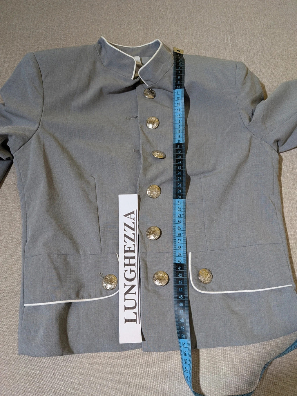 Imperial grey suit with white piping and jewel buttons, elegant fitted blazer and pants.