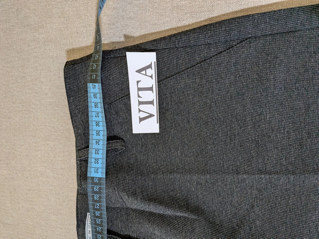 Made in Italy grey suit with three-button jacket and straight-leg trousers, soft fabric.