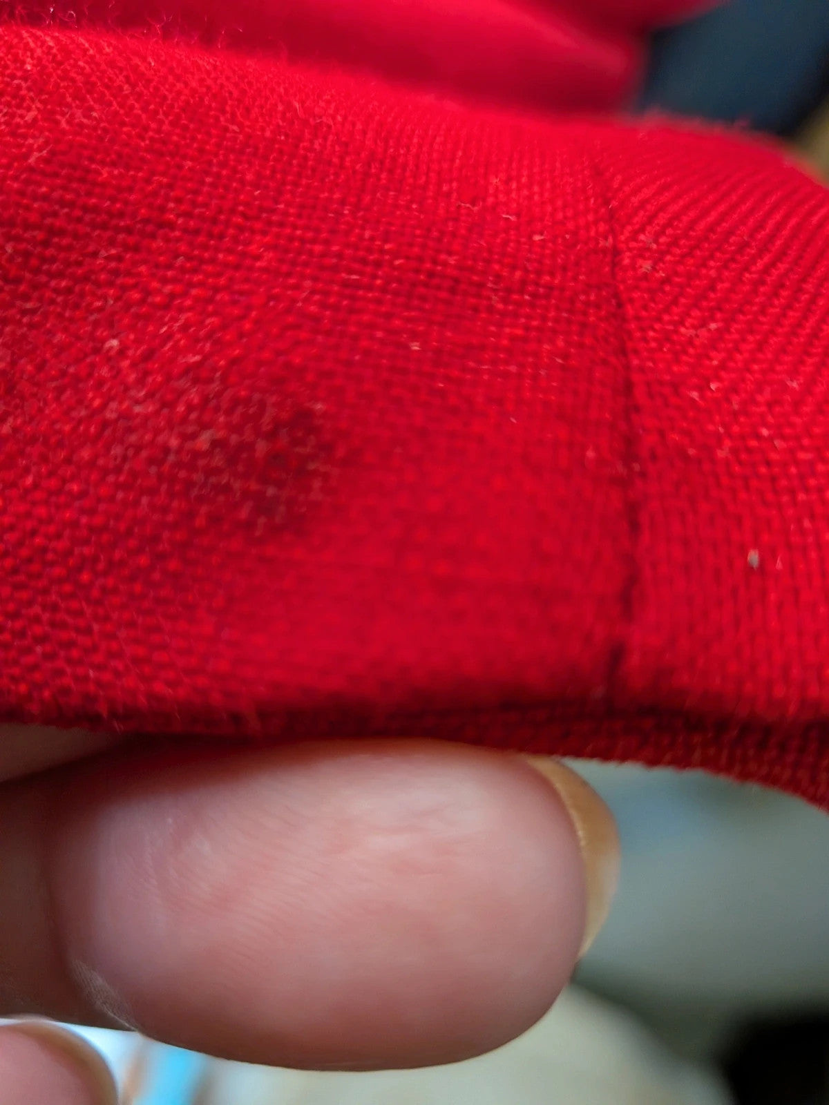 Tessuto red skirt suit with double-breasted jacket and linen-like texture.