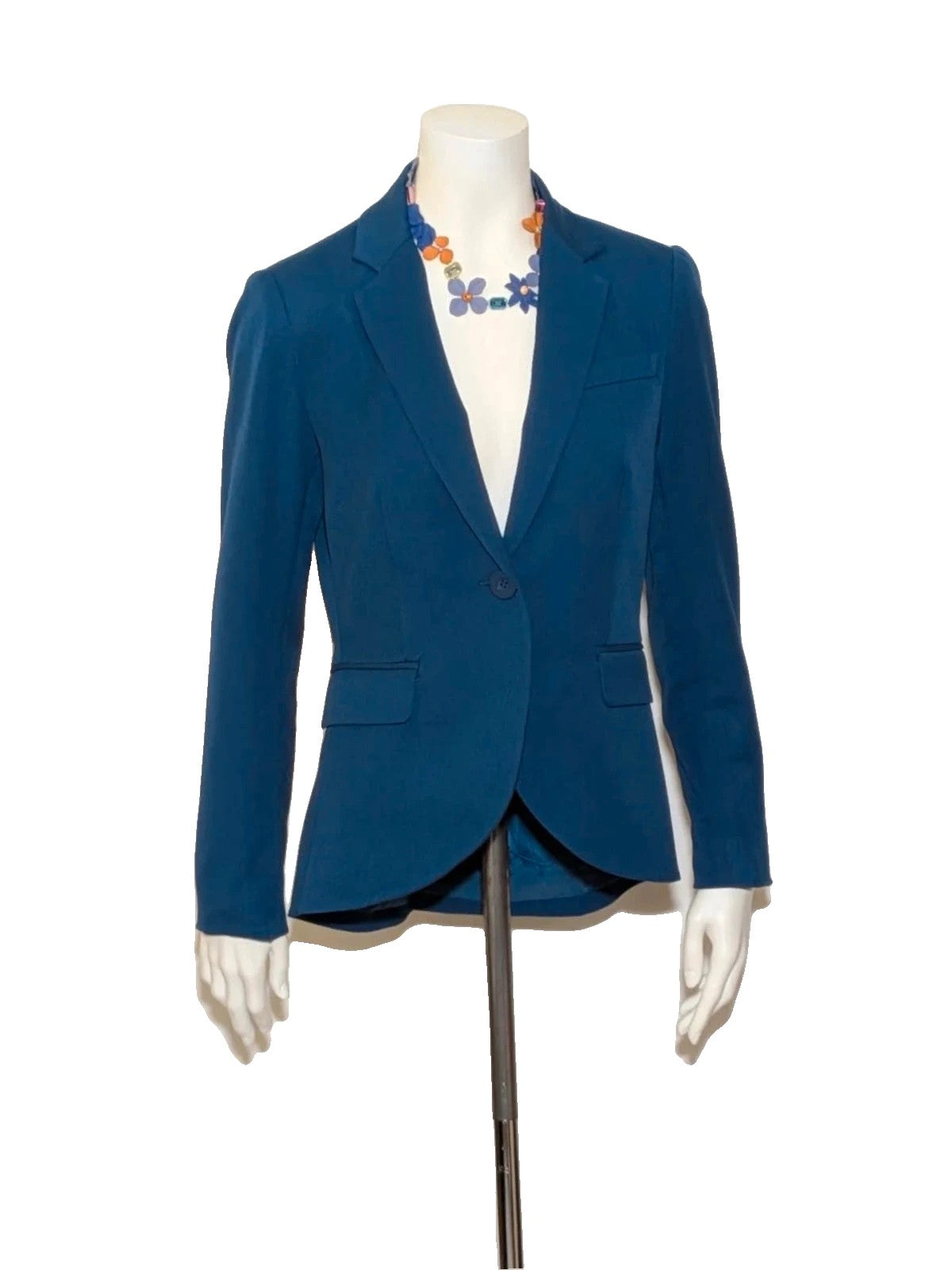 ONLY navy blazer with single-button closure and faux front pockets, modern fitted cut.
