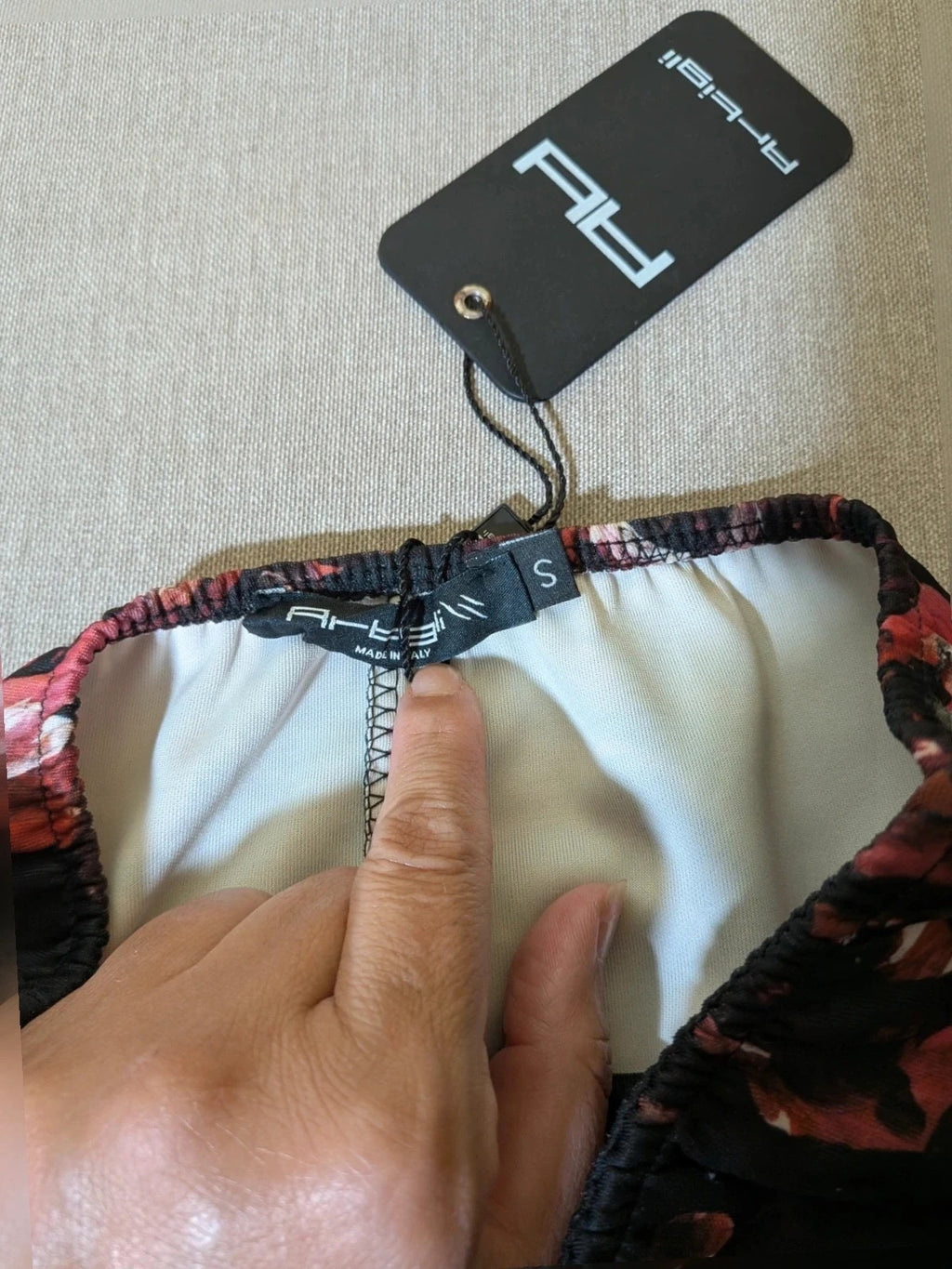 Artigli black linen maxi dress with floral pattern in pink and burgundy, strapless design.