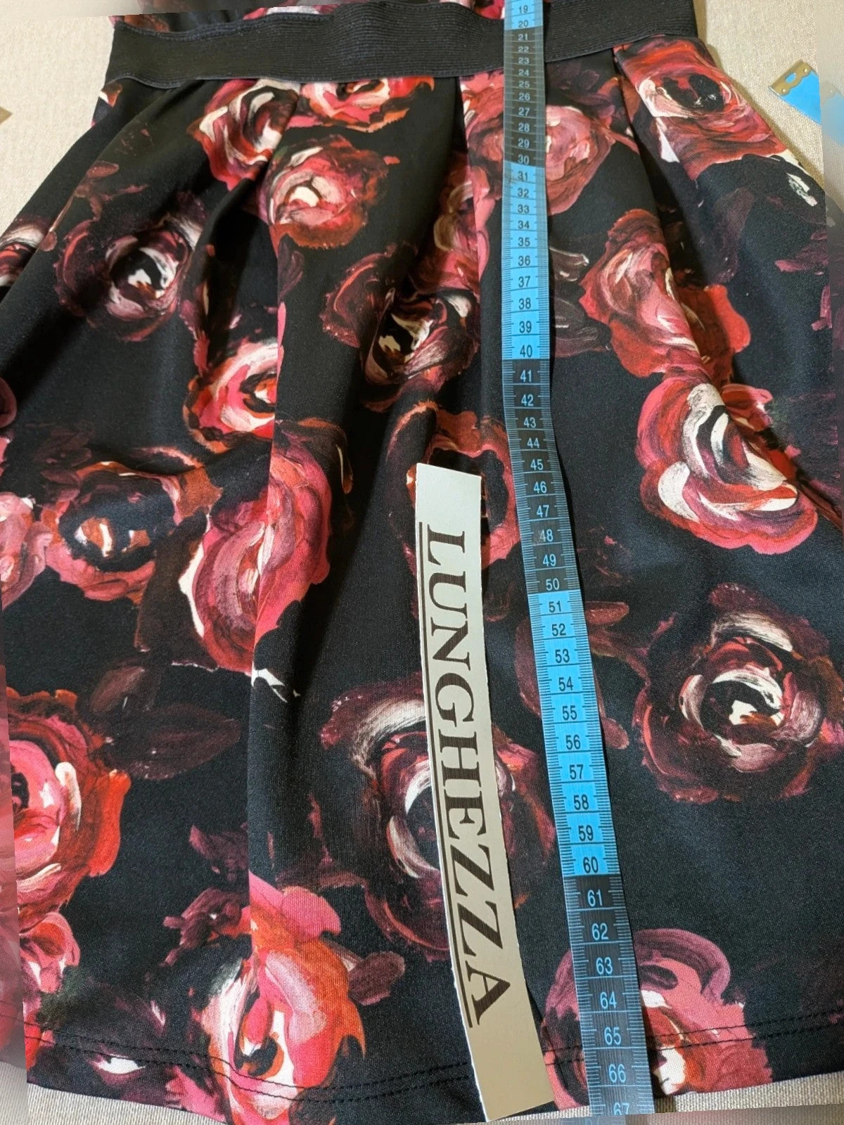 Artigli black linen maxi dress with floral pattern in pink and burgundy, strapless design.