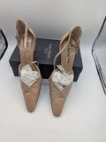 Anna Martini beige heels with satin finish, pointed toe, and adjustable ankle strap.