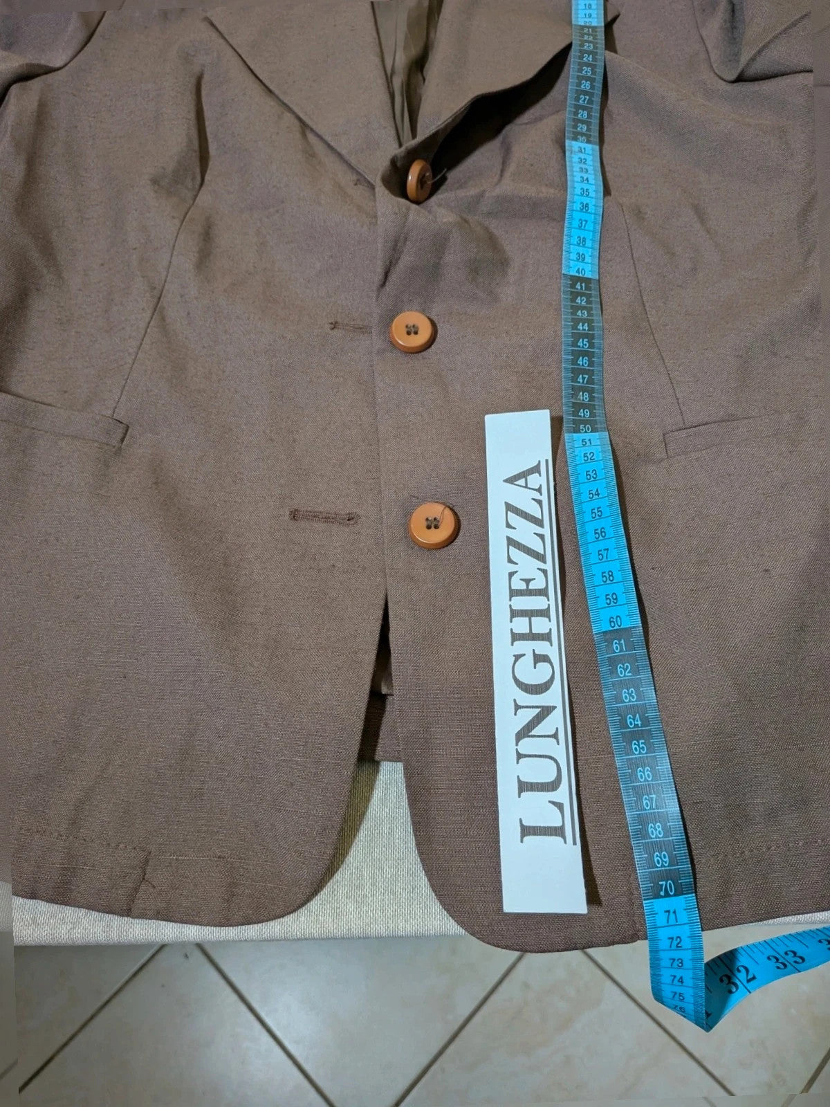 Blazer brown skirt suit with short sleeves, natural fabric texture, vintage style.