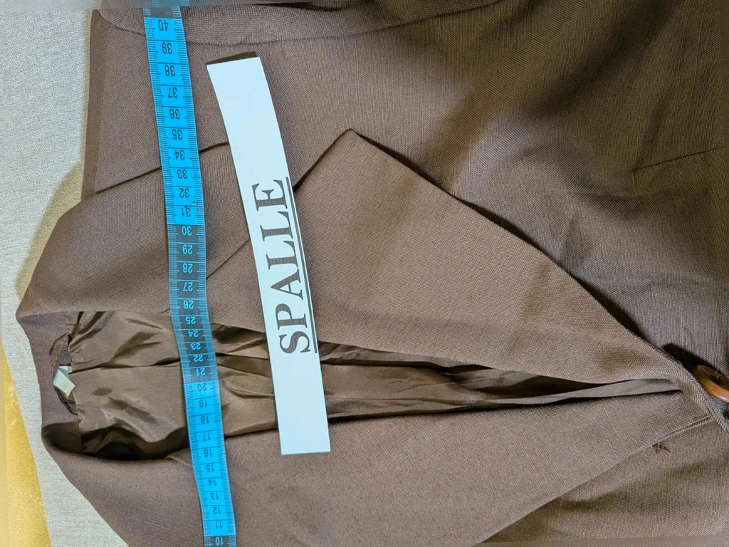Blazer brown skirt suit with short sleeves, natural fabric texture, vintage style.