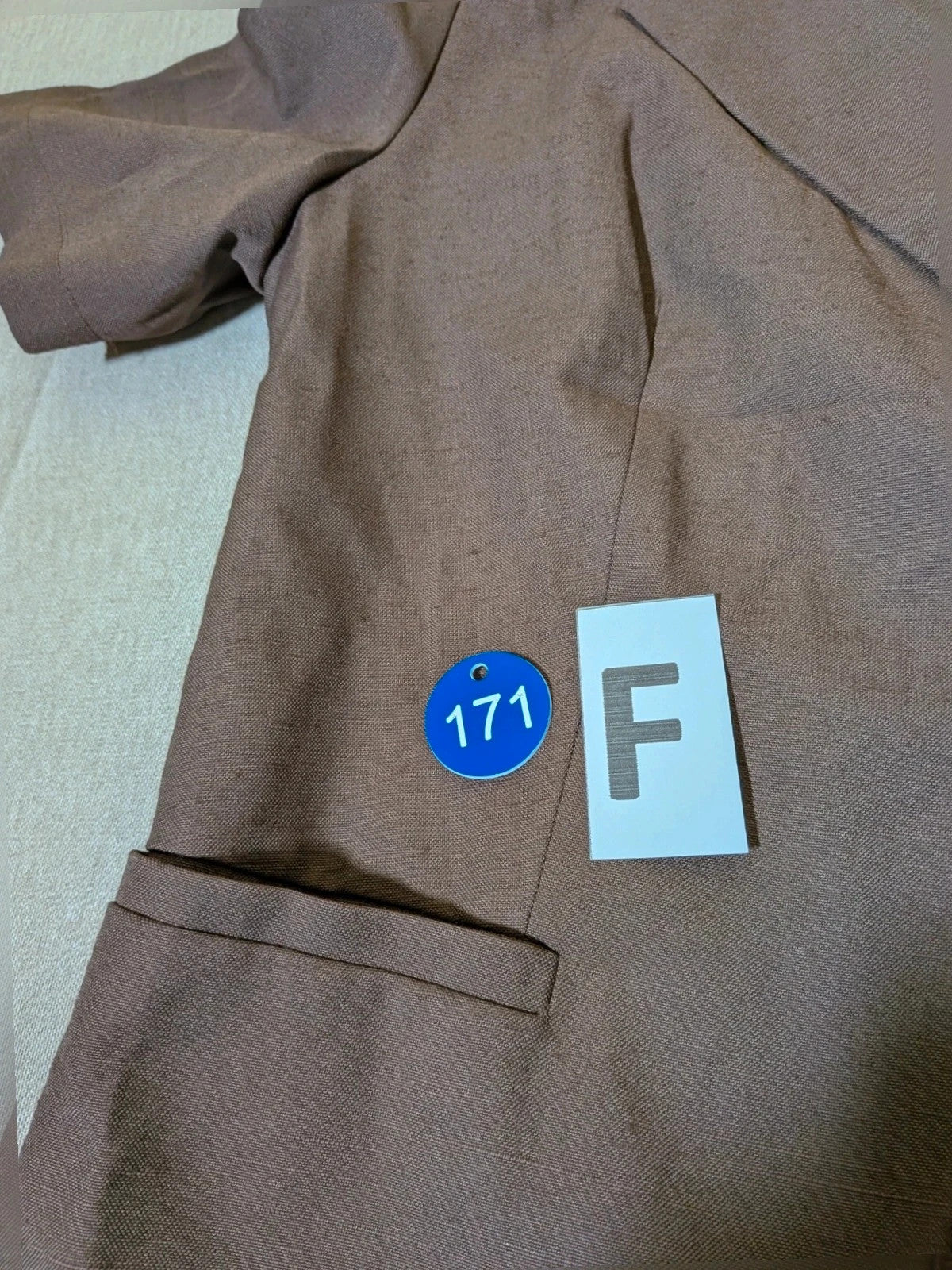 Blazer brown skirt suit with short sleeves, natural fabric texture, vintage style.