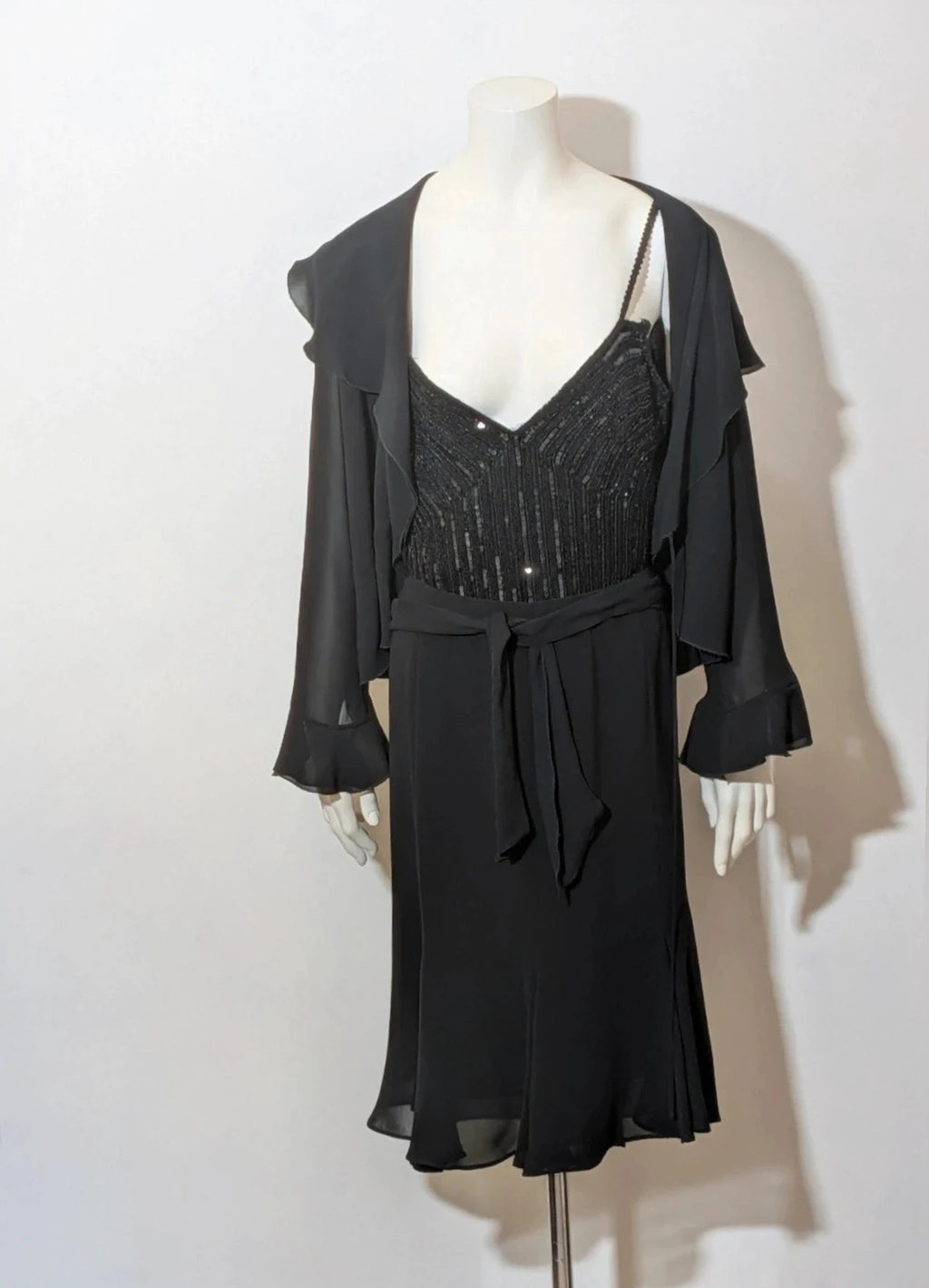 Modyva black casual ruffle maxi dress with sequined top and elegant belt detail.