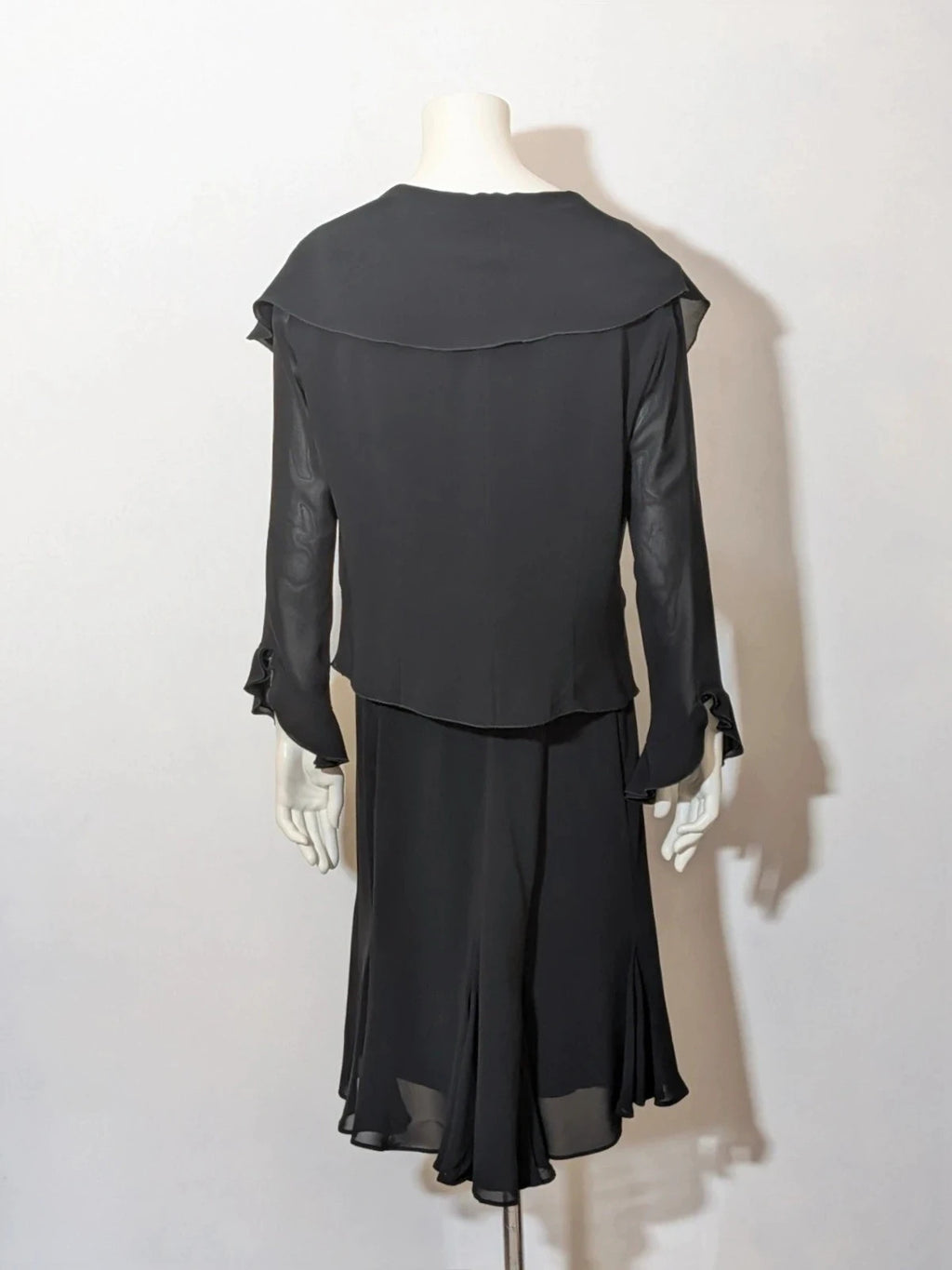 Modyva black casual ruffle maxi dress with sequined top and elegant belt detail.