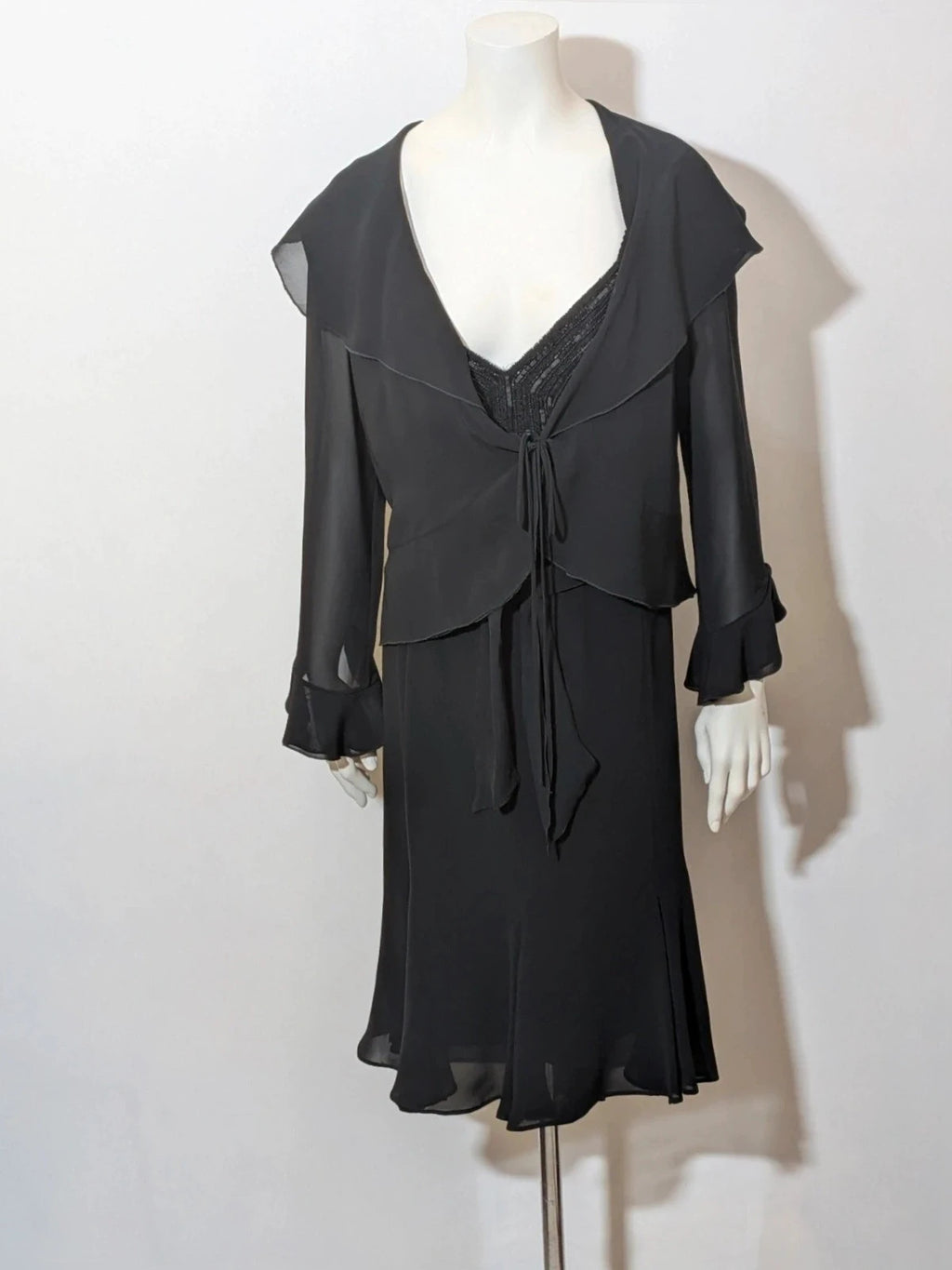 Modyva black casual ruffle maxi dress with sequined top and elegant belt detail.