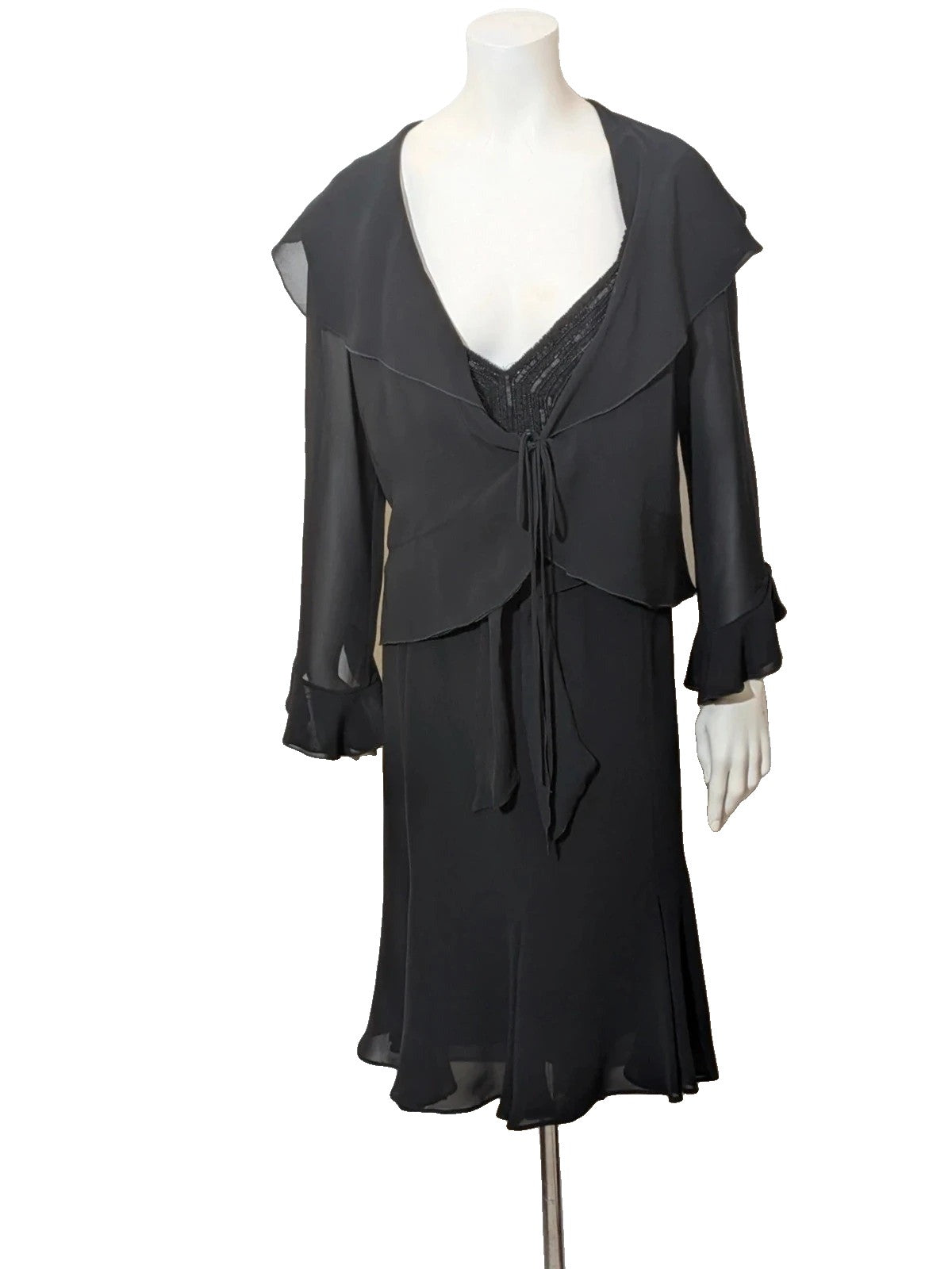 Modyva black casual ruffle maxi dress with sequined top and elegant belt detail.