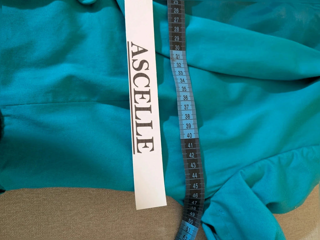 M-Made in Italy turquoise blazer suit with elegant lapel and white trousers, cotton blend.