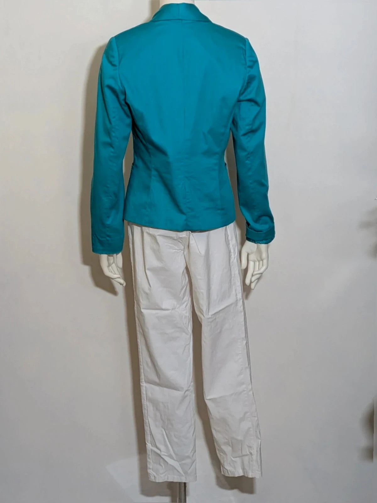 M-Made in Italy turquoise blazer suit with elegant lapel and white trousers, cotton blend.