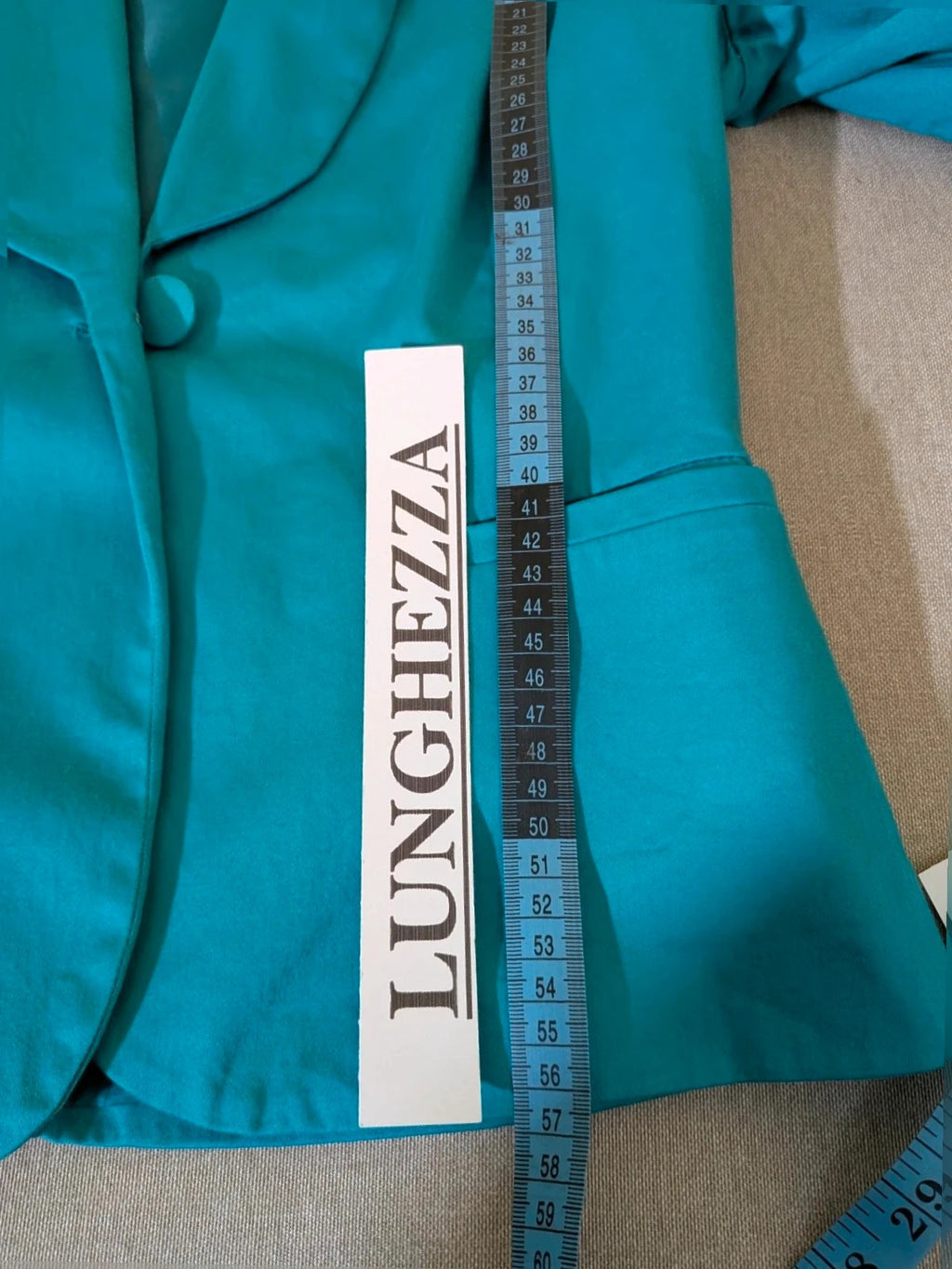 M-Made in Italy turquoise blazer suit with elegant lapel and white trousers, cotton blend.