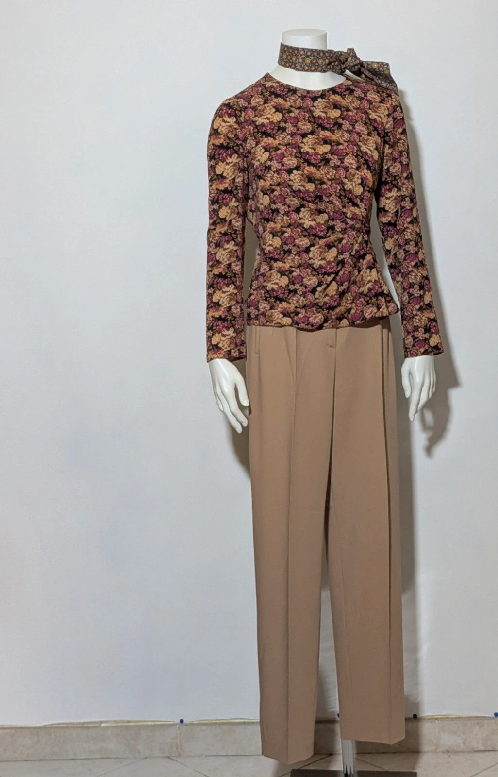 Gerry Weber multi suit with floral Primark top, draped design, and camel trousers.