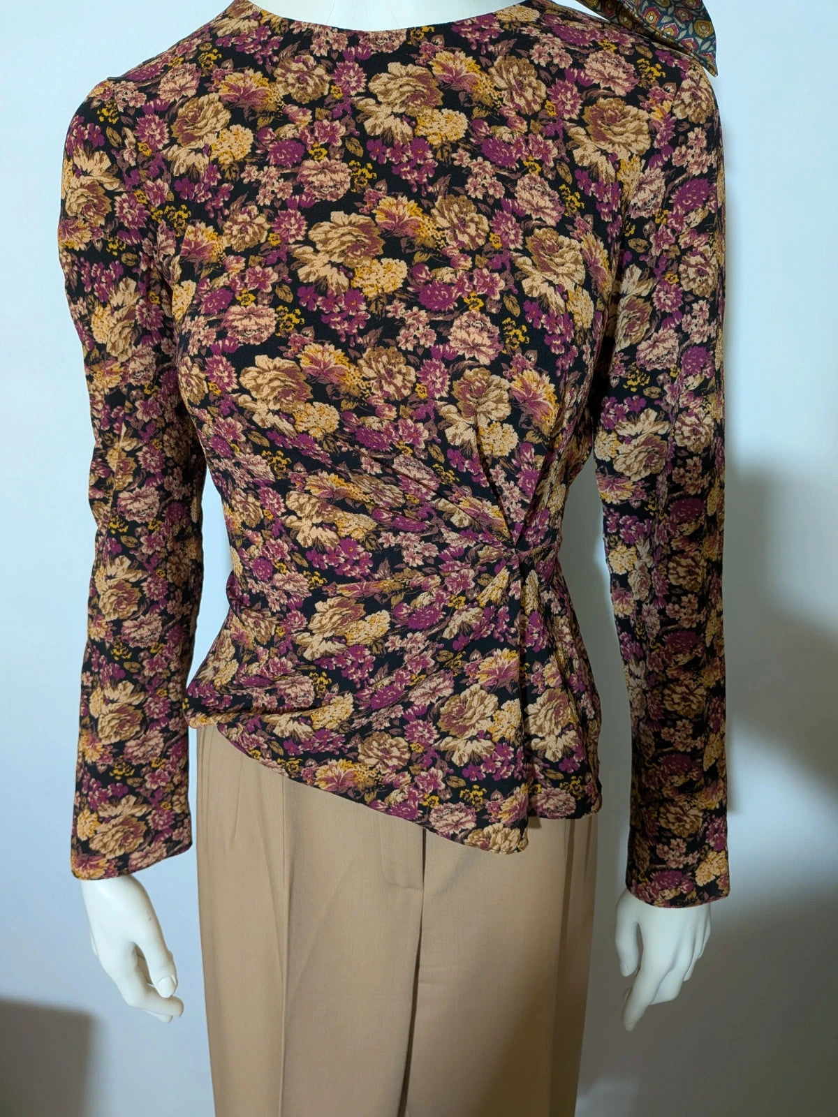 Gerry Weber multi suit with floral Primark top, draped design, and camel trousers.