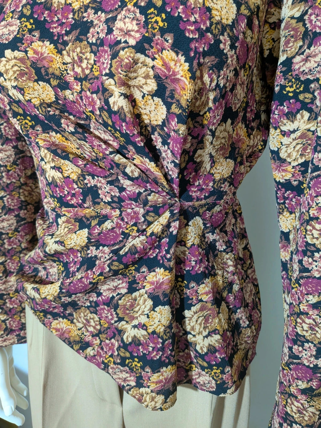 Gerry Weber multi suit with floral Primark top, draped design, and camel trousers.