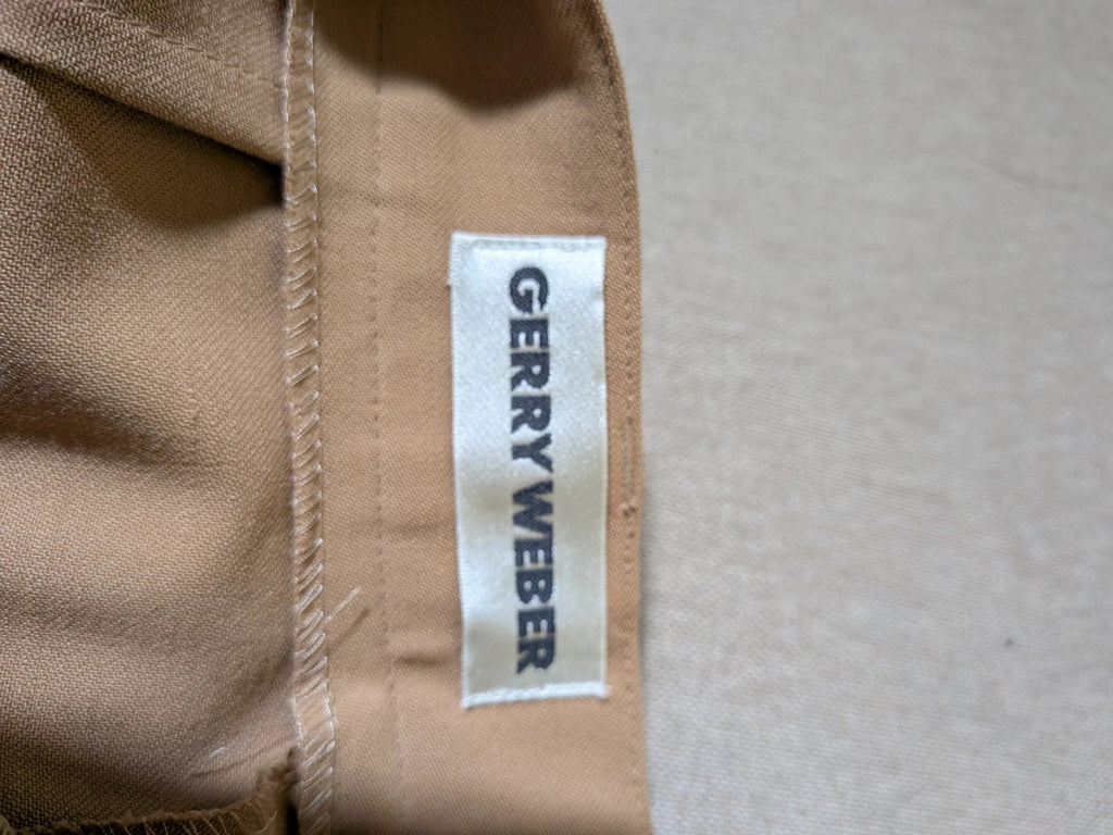 Gerry Weber multi suit with floral Primark top, draped design, and camel trousers.