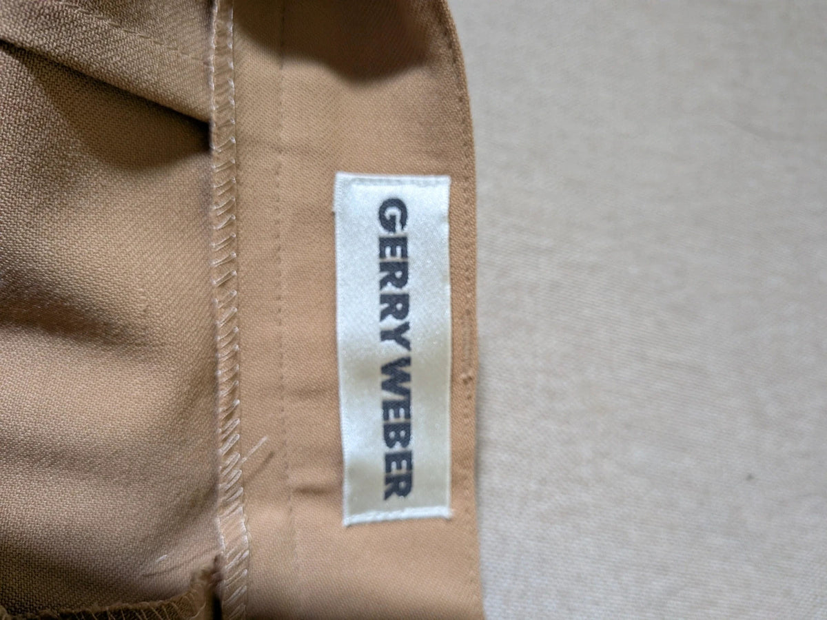Gerry Weber multi suit with floral Primark top, draped design, and camel trousers.