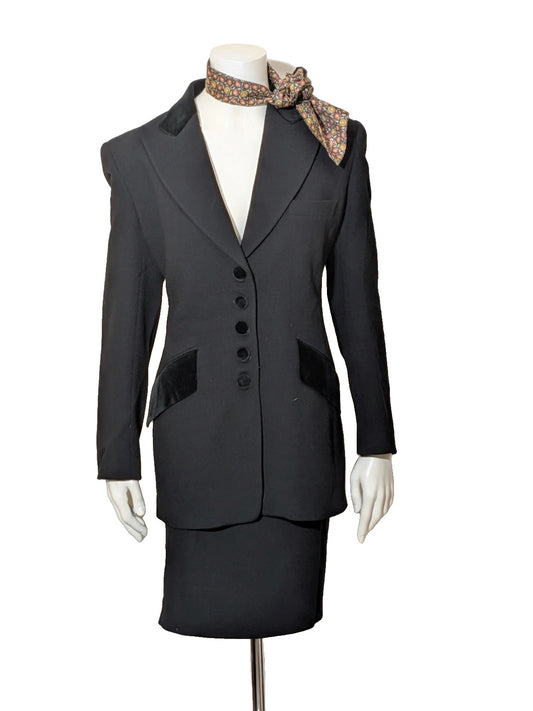 Paolo Tonali black skirt suit, tailored wool, velvet button closure, elegant design.