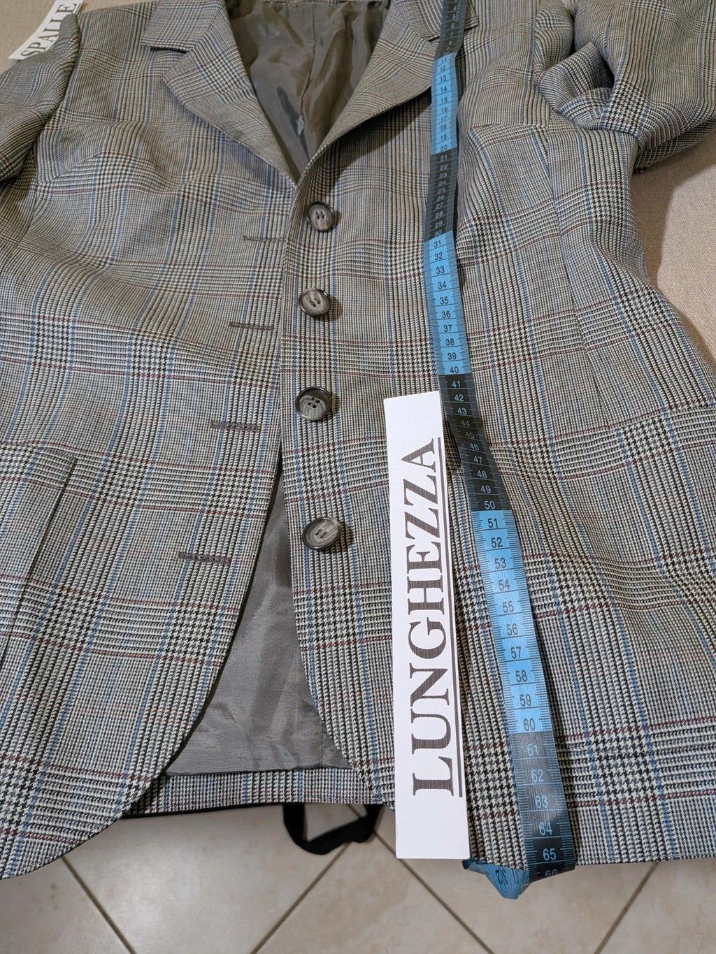 Retro grey multi skirt suit with Prince of Wales check pattern, structured jacket and fully lined skirt.