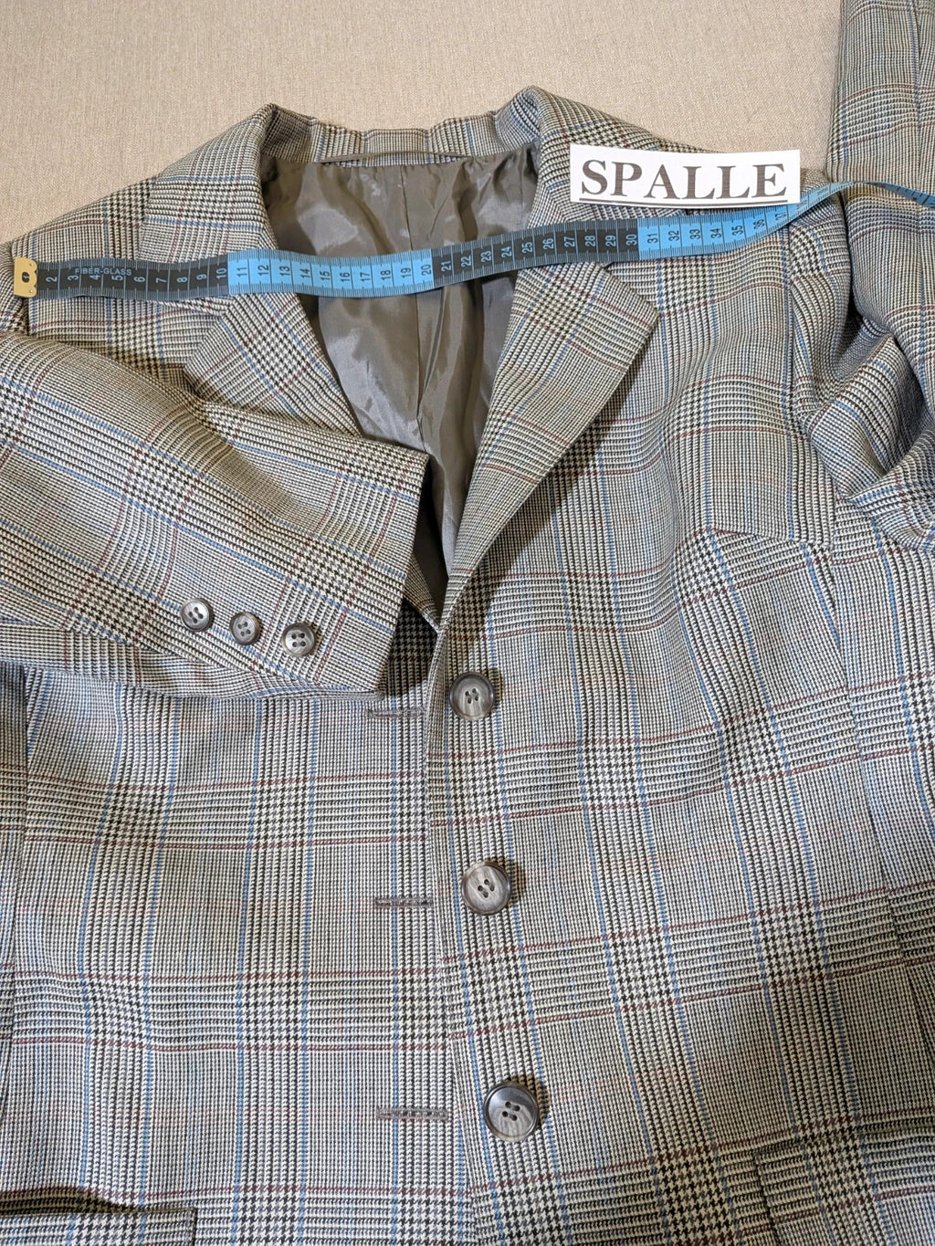 Retro grey multi skirt suit with Prince of Wales check pattern, structured jacket and fully lined skirt.