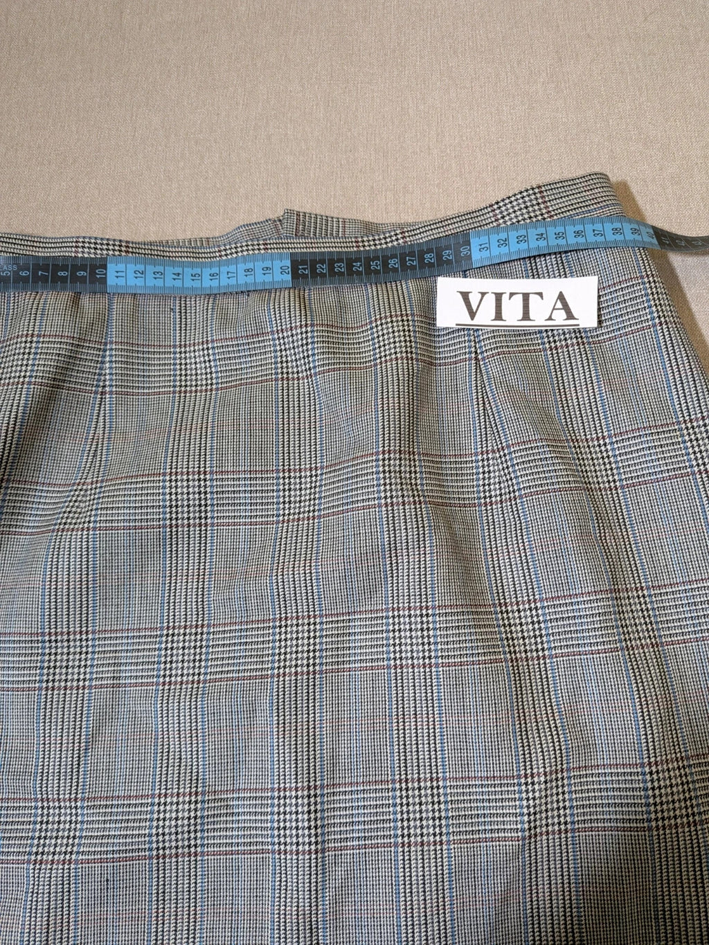 Retro grey multi skirt suit with Prince of Wales check pattern, structured jacket and fully lined skirt.