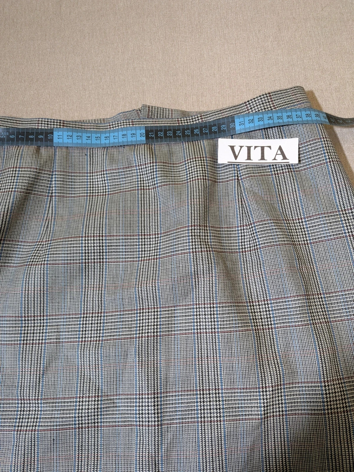Retro grey multi skirt suit with Prince of Wales check pattern, structured jacket and fully lined skirt.