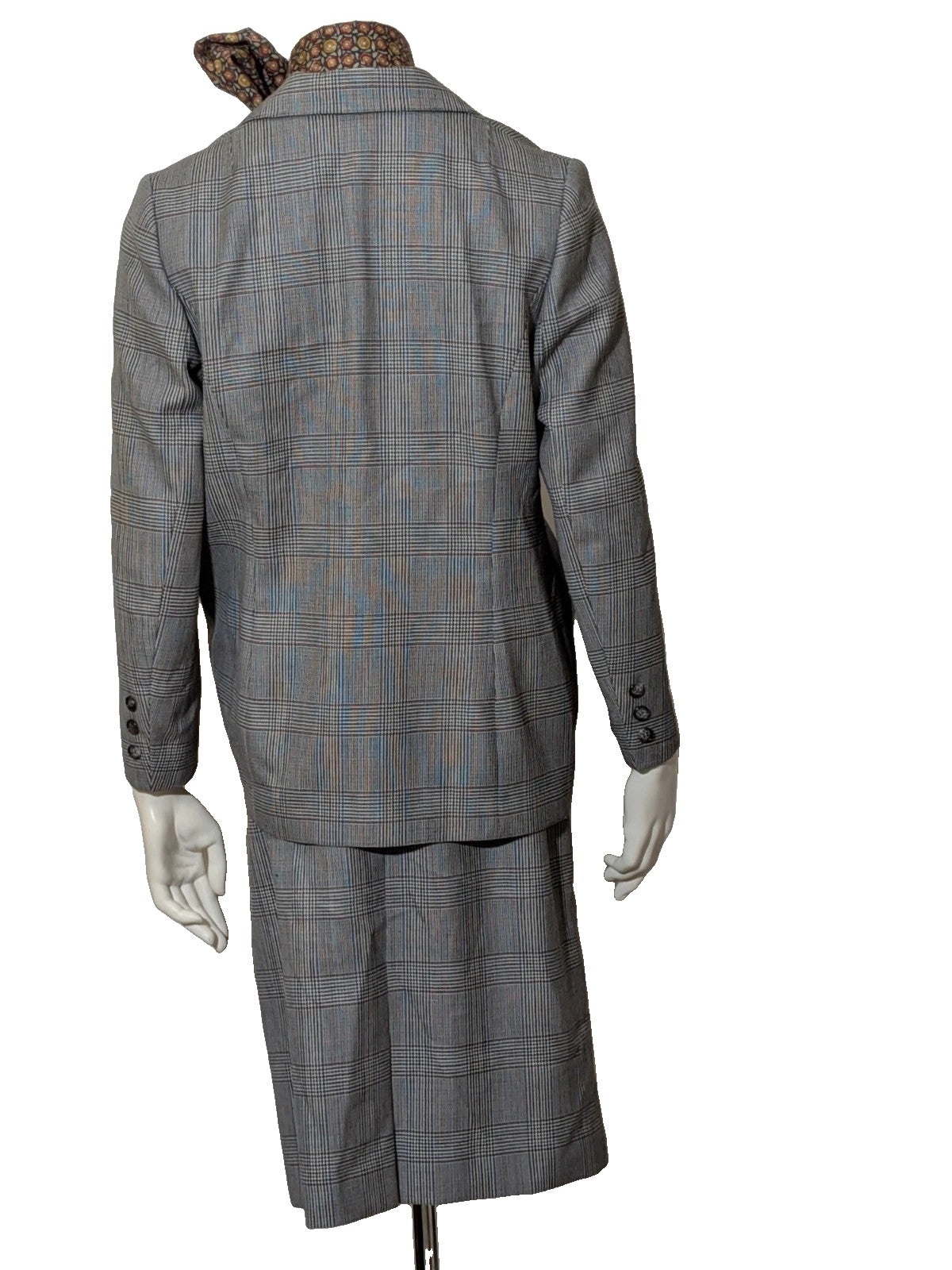 Retro grey multi skirt suit with Prince of Wales check pattern, structured jacket and fully lined skirt.