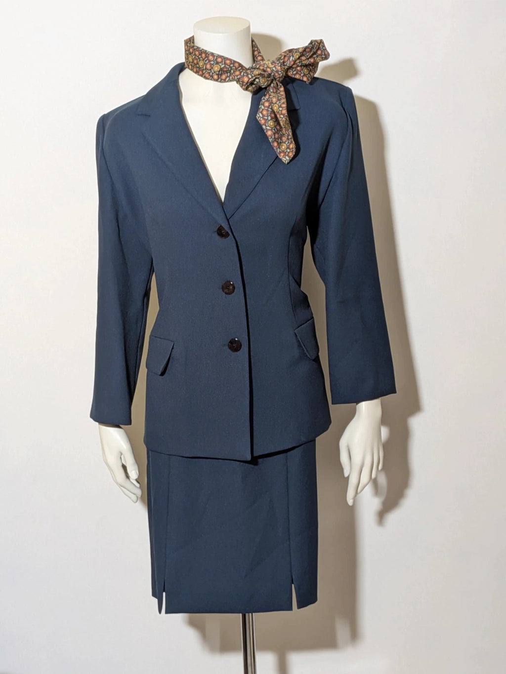 Sara Glenzer navy skirt suit, vintage blazer with three-button closure and straight skirt with slits.